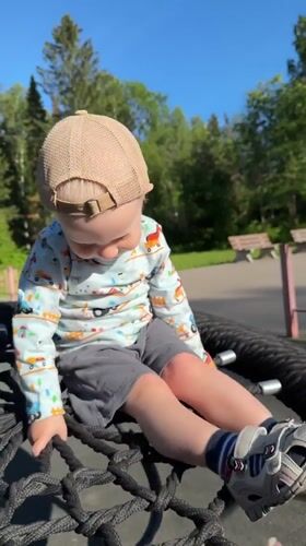 Child plays at playground in Vereshchagino, Russia