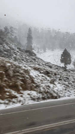 Heavy snowfall reduces visibility for motorist in Akseki, Turkey