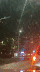 Nighttime street scene captured from moving vehicle