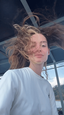 Woman travels by boat in Khao Phang, Thailand