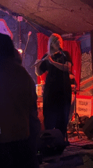Live band performance on a dim Belgrade stage