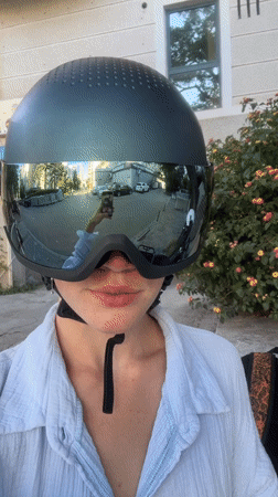 Motorcycle riders film selfies while touring Budva streets