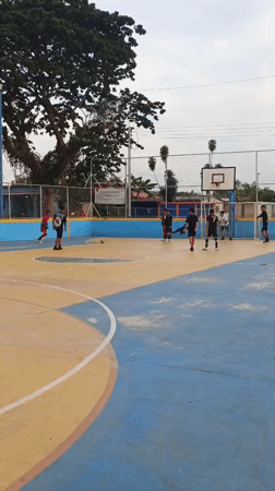 Young people play evening futsal match in Tinaquillo, Venezuela