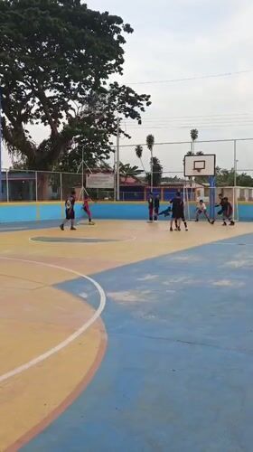 Young people play evening futsal match in Tinaquillo, Venezuela