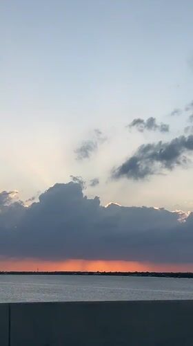 Sunset captured over water from Cleveland area bridge