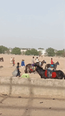 Horse riders train in sandy area in Giginyu, Nigeria