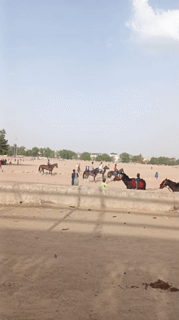 Horse riders train in sandy area in Giginyu, Nigeria