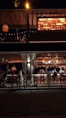Tourist captures nighttime resort and market scenes in Thailand