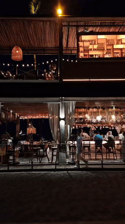 Tourist captures nighttime resort and market scenes in Thailand