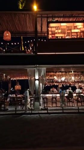 Tourist captures nighttime resort and market scenes in Thailand