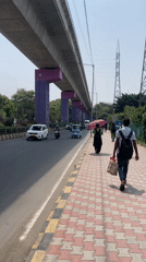 Morning commute captured beneath Bengaluru's elevated metro line