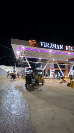 Massive moth swarm draws crowds at Nigeria gas station