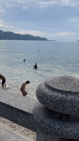 Ordinary morning moments captured along Nha Trang beach promenade
