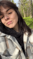 Mother and baby enjoy sunny park stroll in Pushkin