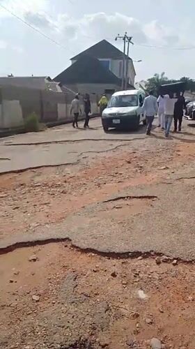Residents navigate heavily damaged roads in Adankolo, Nigeria