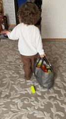 Girl with toy blocks spotted walking in Chaikovsky, Russia