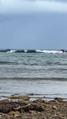 Night surfing session documented at Santa Monica Philippines beach
