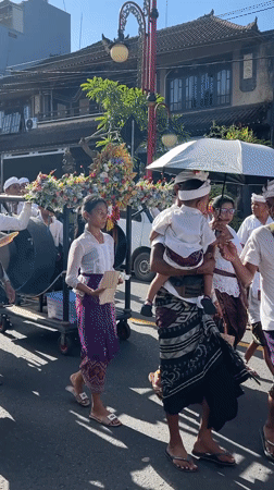 Traditional Balinese procession with music observed in Blahbatuh