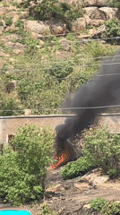 Fire burns near building in Gura Top, Nigeria