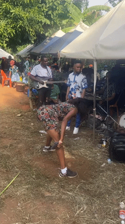 Outdoor gathering held in Eziama, Nigeria under sunny skies