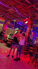 Neon-lit nightclub buzzing in San Bartolomé de Tirajana