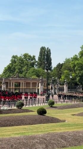 Palace guards perform ceremonial duties at Buckingham Palace