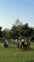 Park gathering draws families for afternoon relaxation and food