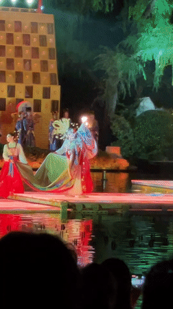 Traditional Chinese dancers perform on floating water stage in Lintong