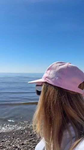 Beach visitors enjoy sunny day in Repino, Russia