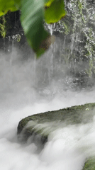 Misty garden waterfall and café at a Ban Na Chom Thian venue