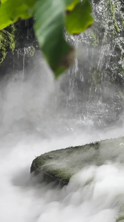 Misty garden waterfall and café at a Ban Na Chom Thian venue