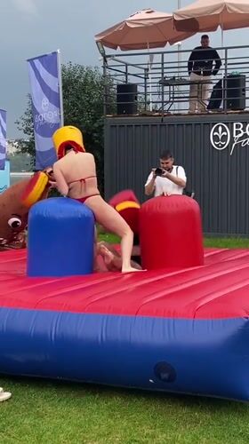 Inflatable jousting match in bikinis at a Perm summer event