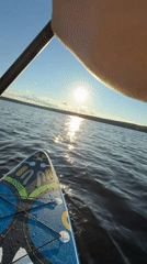Paddleboarder enjoys afternoon session on Russian lake