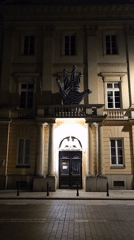 Striped hand sculpture spotted on Warsaw building facade