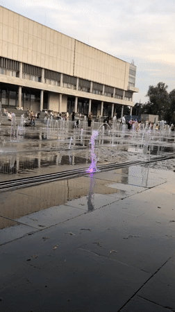 Moscow waterfront evening: fountains, flowers, boats, sunset strolls