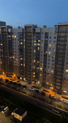 Dusk captures modern Russian residential complex from multiple angles