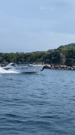 Speedboat crossing the waters off Nha Trang's island coastline