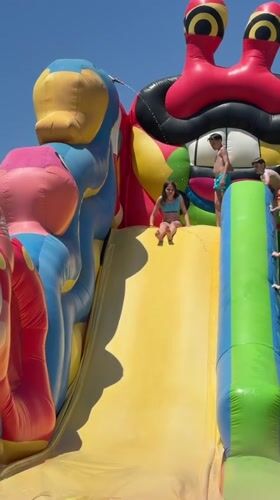 Families enjoy inflatable water park on Montenegro beach