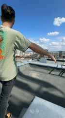 Rooftop cityscape filmed in Sofia under blue skies