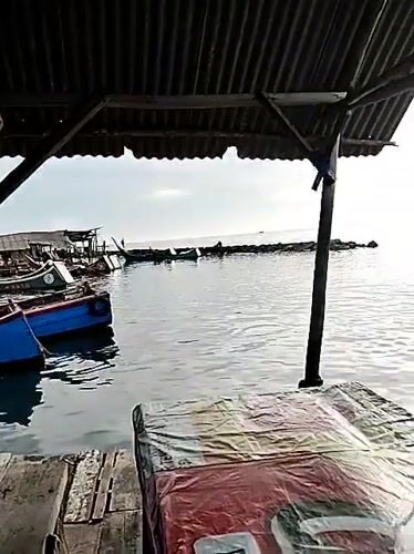 Early morning fish market operations documented in Lhokseumawe Indonesia