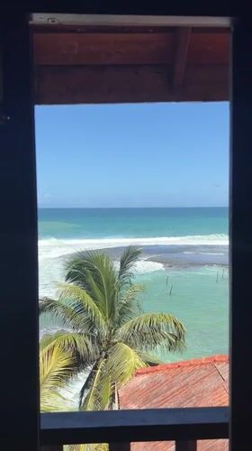 Morning window views capture coastal Sri Lankan towns