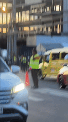 Police conduct traffic control operations at Davao City intersection