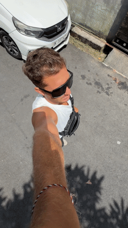 Early morning street scene and caged pigeons observed in North Kuta