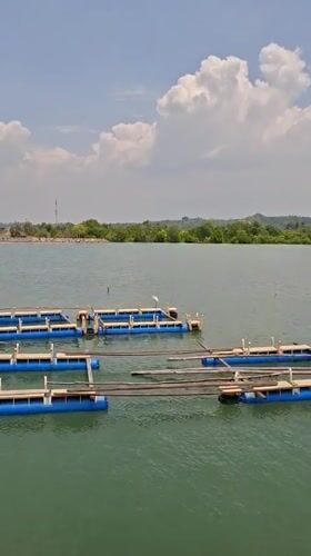 Morning activity on Lhokseumawe's littered waterfront