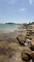 Two women enjoy sunny morning on Dhadna coastline