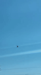 Helicopter spotted flying over Kyiv on clear morning