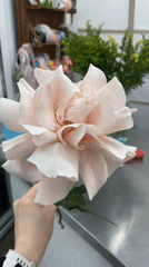 Flower shop workers arrange bouquets in Yekaterinburg workspace