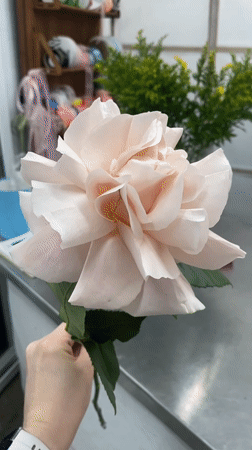 Flower shop workers arrange bouquets in Yekaterinburg workspace