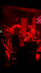 Late-night live band performance recorded at La Plata venue