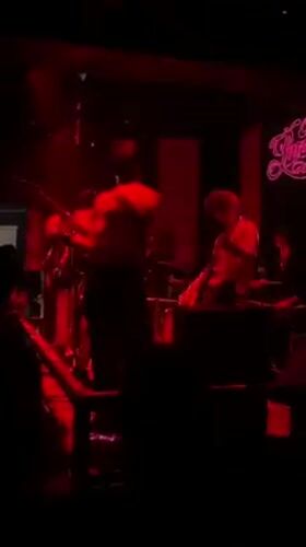 Late-night live band performance recorded at La Plata venue